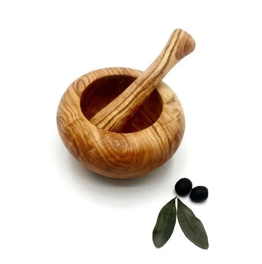 Handmade olive wood mortar and pestle with rustic Mediterranean grain, perfect for grinding spices, herbs, and nuts
