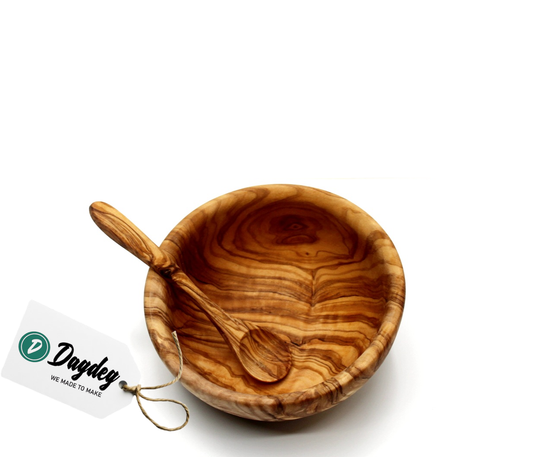 Handcrafted 12 cm olive wood bowl with matching spoon, perfect for baby feeding and Montessori-inspired meals